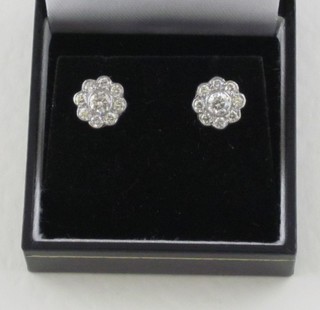A pair of diamond cluster earrings approx 0.90ct