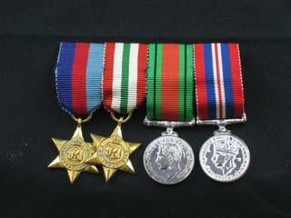 A group of 4 miniature medals comprising 1939-45 Star, Italy Star, Defence and War medal