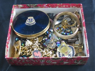 A gilt metal and enamelled compact and a collection of various costume jewellery