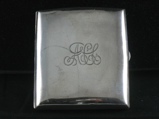 A silver cigarette case Birmingham 1910 2 ozs
