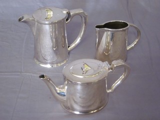 An Art Deco 3 piece silver plated hotelware tea service  comprising teapot, hotwater jug and cream jug
