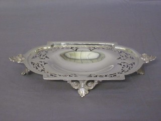 A rectangular pierced silver twin handled dish raised on panelled supports, Birmingham 1927, 5 ozs ILLUSTRATED