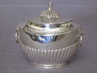A Victorian oval embossed silver twin handled caddy with demi-reeded decoration and ring drop handles, London 1899 6  ozs PLEASE NOTE THIS LOT HAS BEEN WITHDRAWN