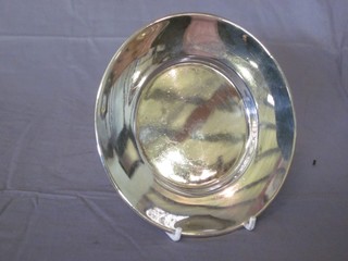A circular silver platter, Sheffield 1909 5" diam