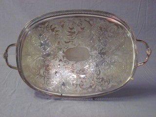 An oval silver plated galleried twin handled tea tray 17"