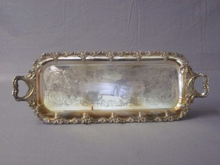 A rectangular engraved silver plated twin handled bottle tray 24"