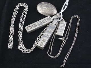 3 silver ingot pendants and a silver locket