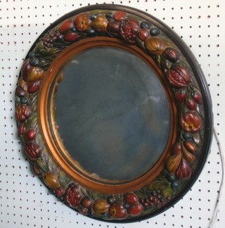 A circular convex plate wall mirror contained in a Barbola style mounted framed 18"
