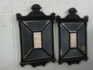 A pair of Edwardian multiple plate mirrors contained in ebony frames 17"