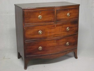 A 19th Century mahogany bow front chest of 2 short and 3 long drawers, raised on splayed bracket feet 35"