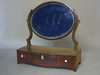 A 19th Century oval plate mahogany dressing table mirror contained in a mahogany frame, the bow front base fitted 1 long and 2 short drawers, raised on bracket feet 20"