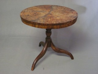 A 19th Century circular mahogany occasional table, raised on a pillar and tripod base 23"