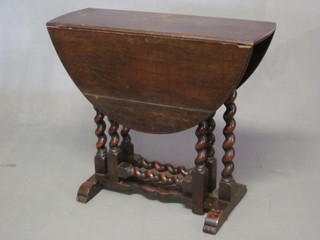 A Victorian oval drop flap gateleg tea table, raised on spiral turned column 28"