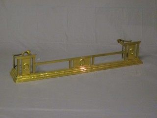 A brassed and railed fire curb 45"