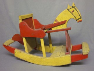 A wooden painted rocking horse 36"