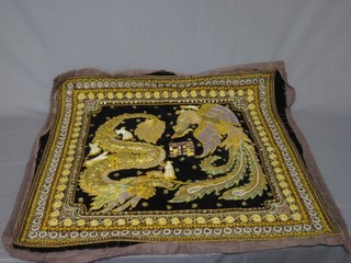 An Eastern embroidered and gold wire panel depicting dragons 32" x 33"