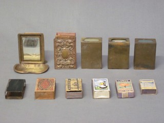 A collection of various brass and other matchbox slips