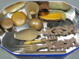 A Victorian heavily carved spoon and fork marked Chamonix, a wooden jam spoon and other items of treen