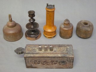 A rectangular carved Eastern box, a lignum vitae stable block, a turned wooden funnel and other items of treen