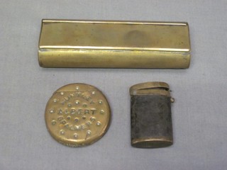 A rectangular brass tinder box and 2 metal vesta cases