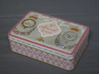 A slice of HRH Prince of Wales and HRH Duchess of Cornwall wedding cake 9 April 2005, contained in a metal tin complete with greetings card and original brown paper box
