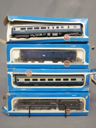 An Airfix OO scale model locomotive and tender, an LMS locomotive Royal Scots Fusiliers together with a British Railways diesel double headed locomotive and 2 carriages