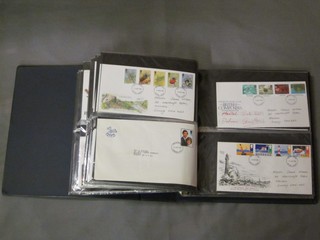 An album of various GB first day covers