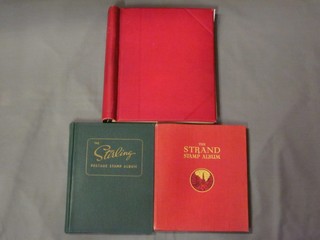 A red Westminster stamp album, a green Stirling stamp album and a red Standard stamp album