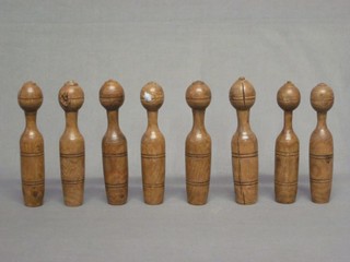 9 various turned wooden skittles 7"