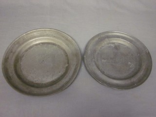2 18th Century circular pewter plates 12" and 11"