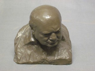 A bronzed head and shoulders portrait bust of Winston Churchill, after Menon 5"