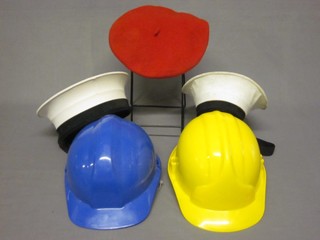 2 Naval Ratings caps, a lady's red beret and 2 plastic hard hats