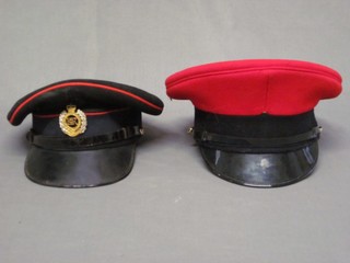 An Elizabeth II Royal Engineers Officer's peak cap by Alkit together with a Royal Military Police cap, no badge,