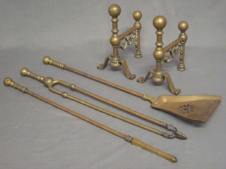 A 19th Century 3 piece brass fireside companion set comprising poker, pair of tongs and a shovel, together with a pair of fire dogs