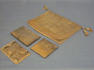 3 snake skin wallets and a snake skin document case