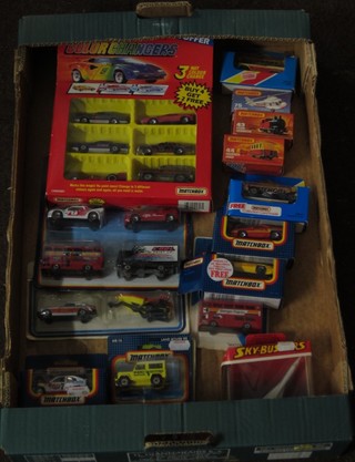 A Matchbox no. 75 Helicopter, do. 43 Steam Locomotive, no. 44 Passenger Carriage boxed, and a collection of Matchbox cars all boxed