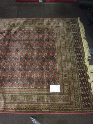 A Bokhara style Belgian cotton rug with numerous octagons to the centre 89" x 62"