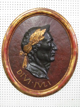 An oval plaque depicting Caesar marked Divi.Ivli 24"