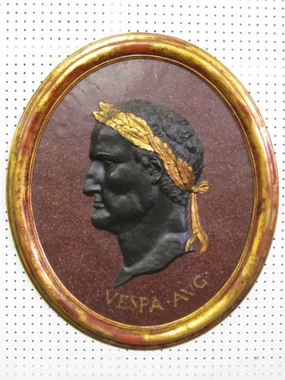 An oval plaque depicting Caesar marked Vespa.Avg 26"