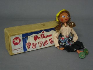 A Pelham puppet type LS Girl, boxed