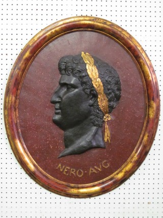 An oval plaque depicting Caesar marked Nero.Avg 26"
