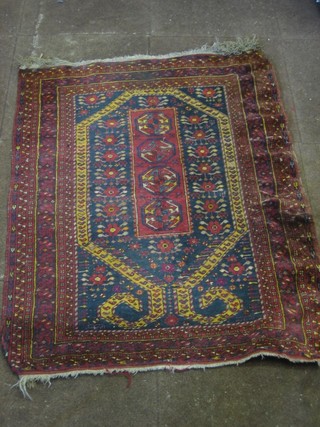 An Afghan rug with lozenge shaped medallion and with 4 octagons the centre 44" x 36", some wear