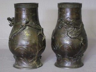 A pair of Japanese bronzed vases decorated dragons 16"