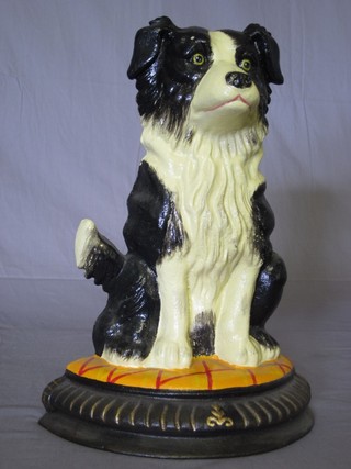 A cast iron door stop in the form of a Collie dog 14"