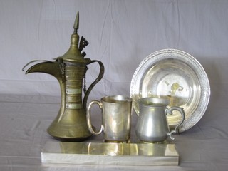 A brass Turkish coffee pot, a baluster shaped pewter tankard, a dish and a rectangular box by Christian Dior
