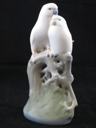 A Royal Copenhagen figure of 2 birds, base marked 649, chipped to tails, 7"