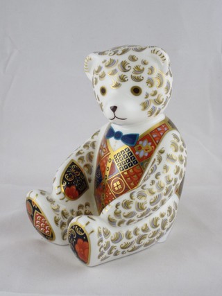 A Royal Crown Derby figure of a seated bear, base marked LXI 4 1/2"