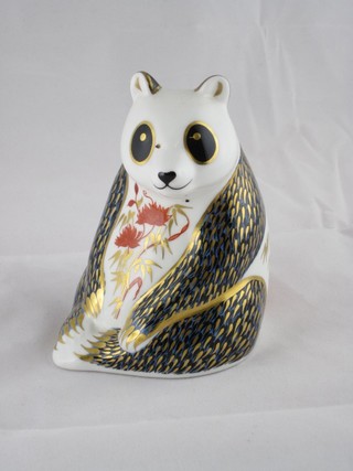 A Royal Crown Derby figure of a seated Panda, the base marked LVII 4"