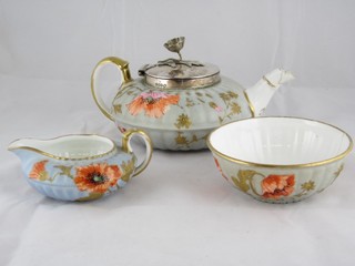 A Wedgwood porcelain 3 piece tea service comprising circular teapot - spout f and r, sugar bowl - f and r, and a cream jug