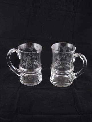 A pair of Edward VII etched glass Coronation tankards marked Friend of The People by T Goode & Co no.2474 and 1361